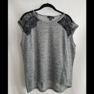 Sleeveless gray shirt with lace shoulders